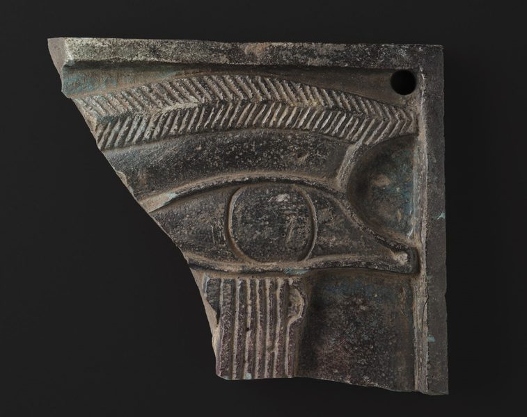 A plaque with a large Eye of Horus carved into it.