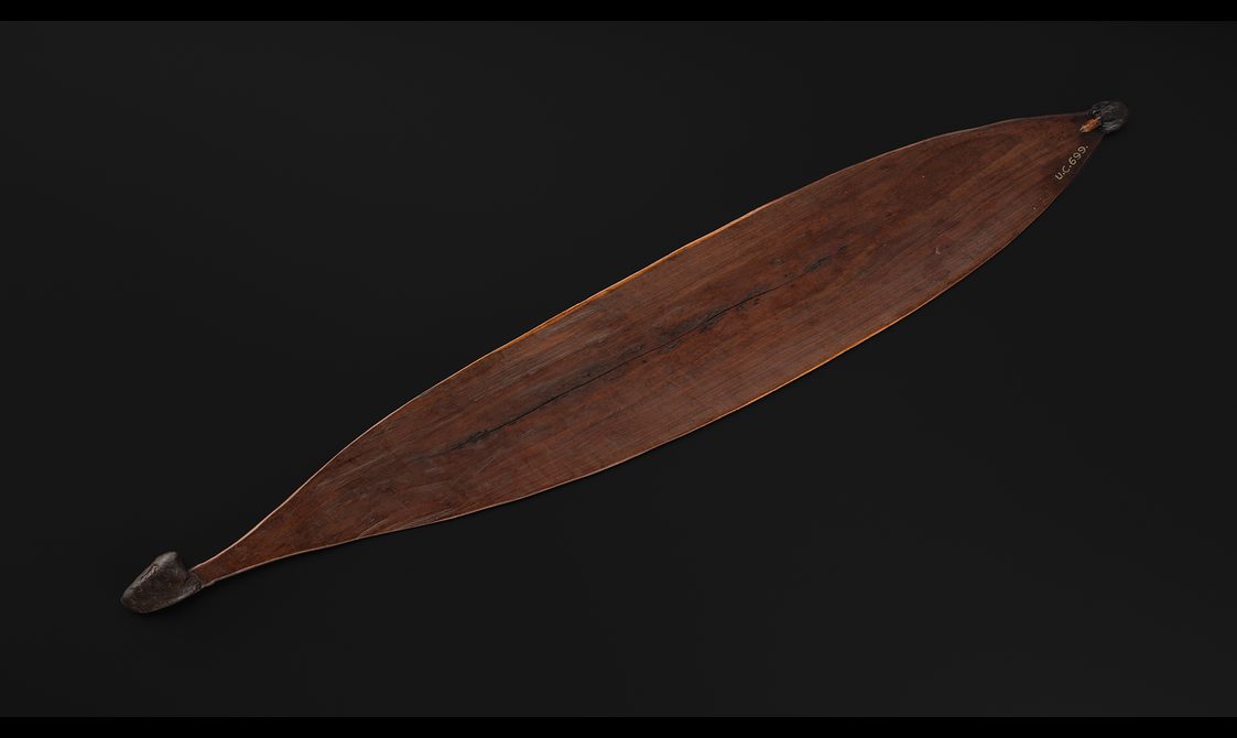 A wooden spear thrower.