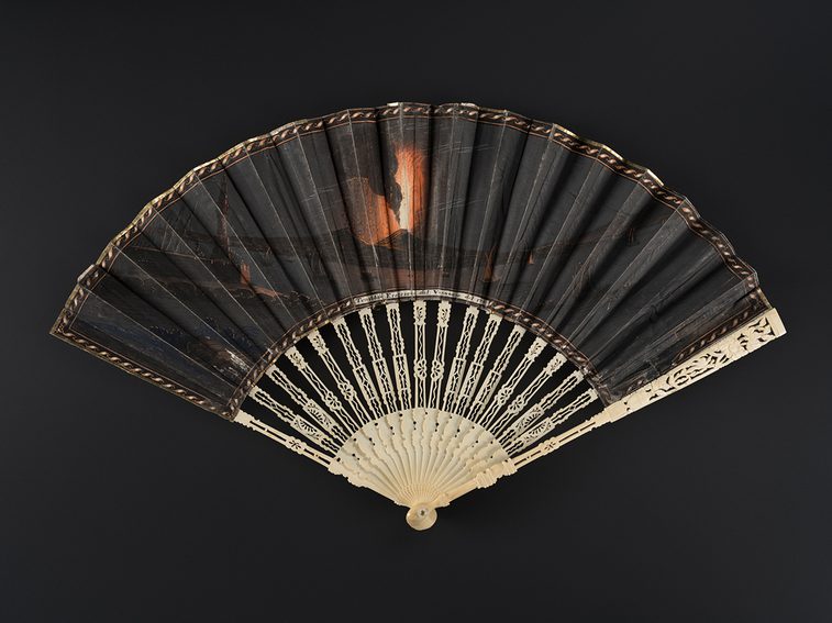 Fan of skin leaf bound with gold paper and mounted on carved bone sticks. Painted with an image of the 1779 eruption of Mount Vesuvius.