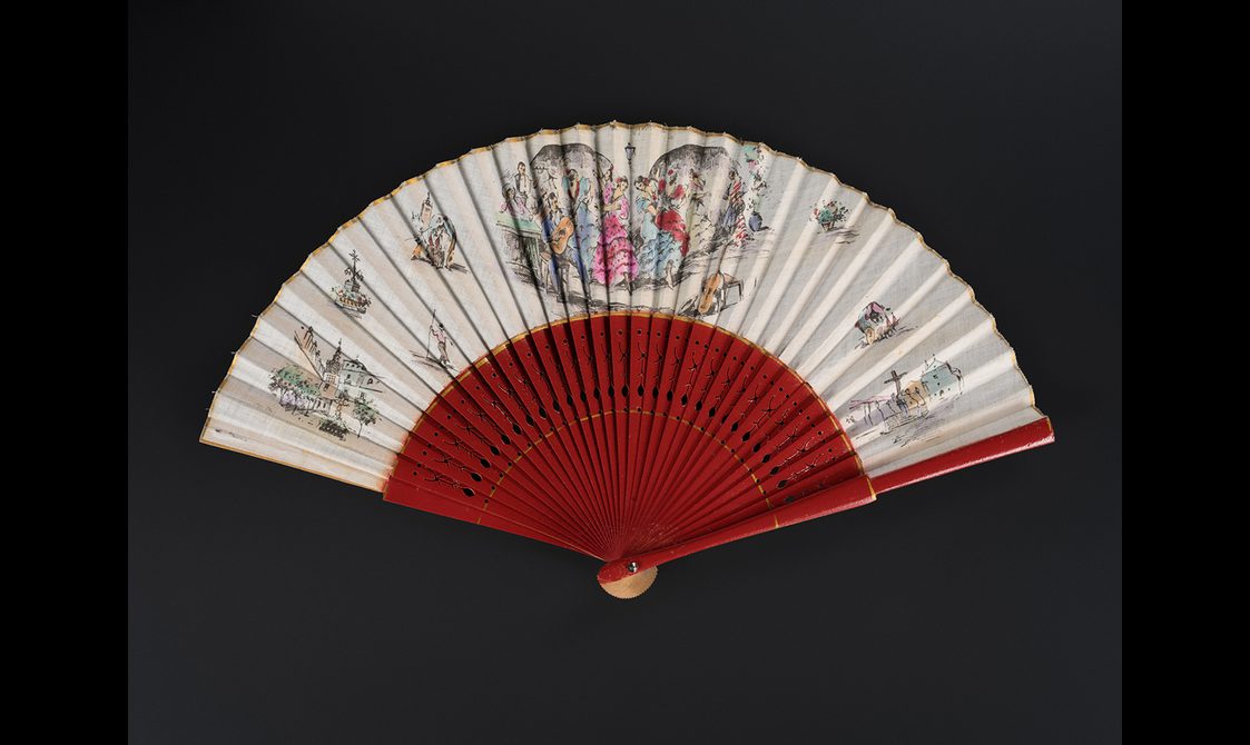 Fan with painted red wooden guards and racks, and cotton leaf. printed with a scene of flamenco dancers and small vignettes of towns.