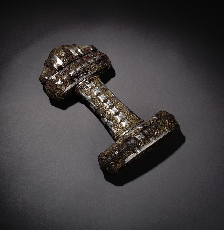 Ornate silver and bronze sword hilt