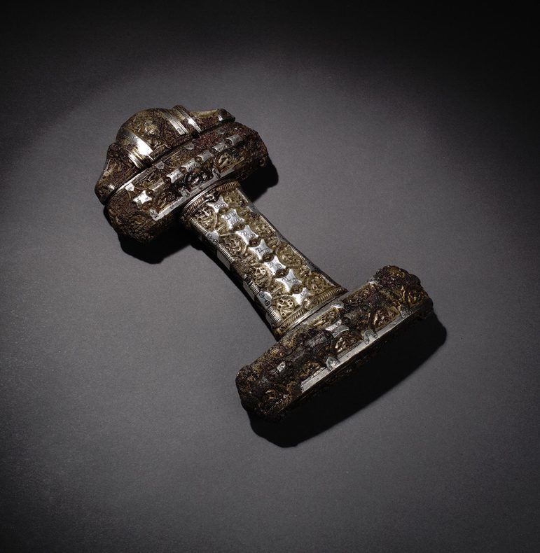 Ornate silver and bronze sword hilt