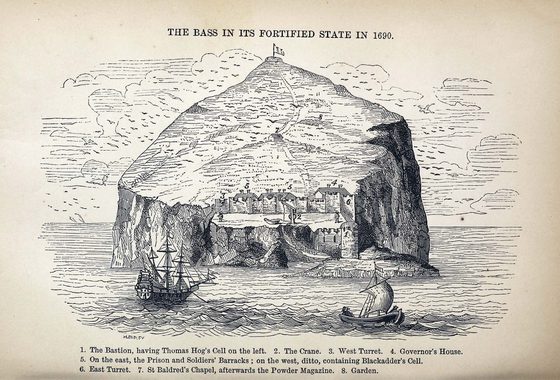 An illustration of an island comprised of large rock with a number of buildings on one side of the rock and two ships in the foreground.