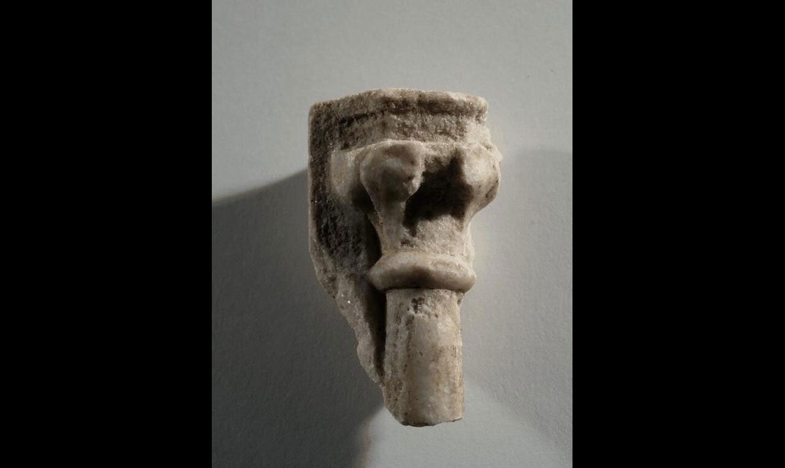 Alabaster fragment with some carving.