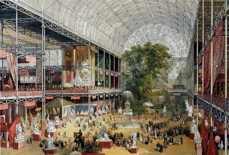 A colour painting depicting the glass roof, iron structures, exhibits and people inside the Crystal Palace building.