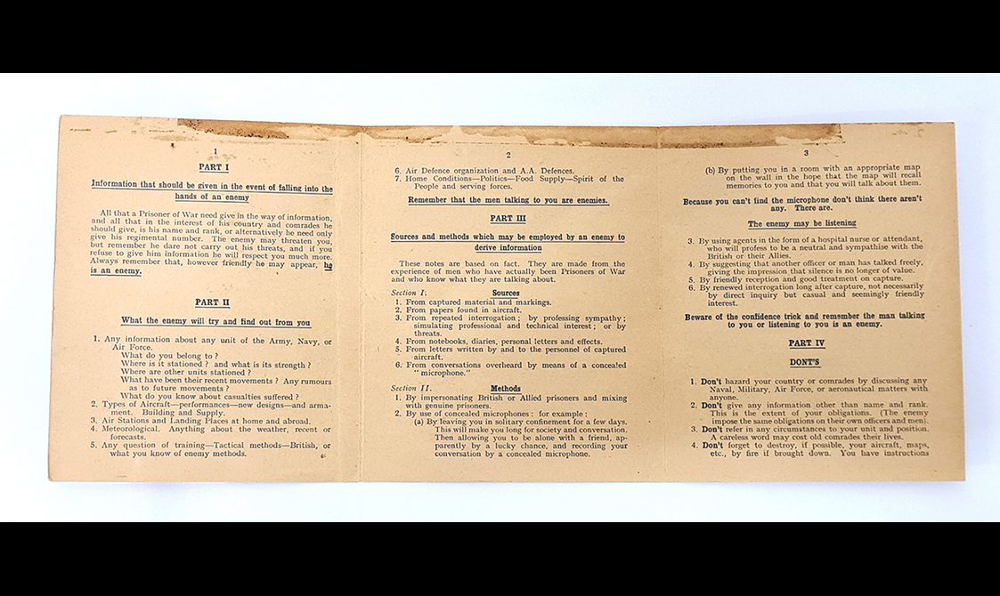 Inner pages of a booklet with headings such as 'iformation that should be given in the event of falling into the hands of the enemy. What the enemy will try and find out from you. Rememer the men talking to you are enemies. Sources and methods which may be employed by an enemy to derive information. Beware of the confidence trick and remember the man talking to you or listening to you is an enemy.'