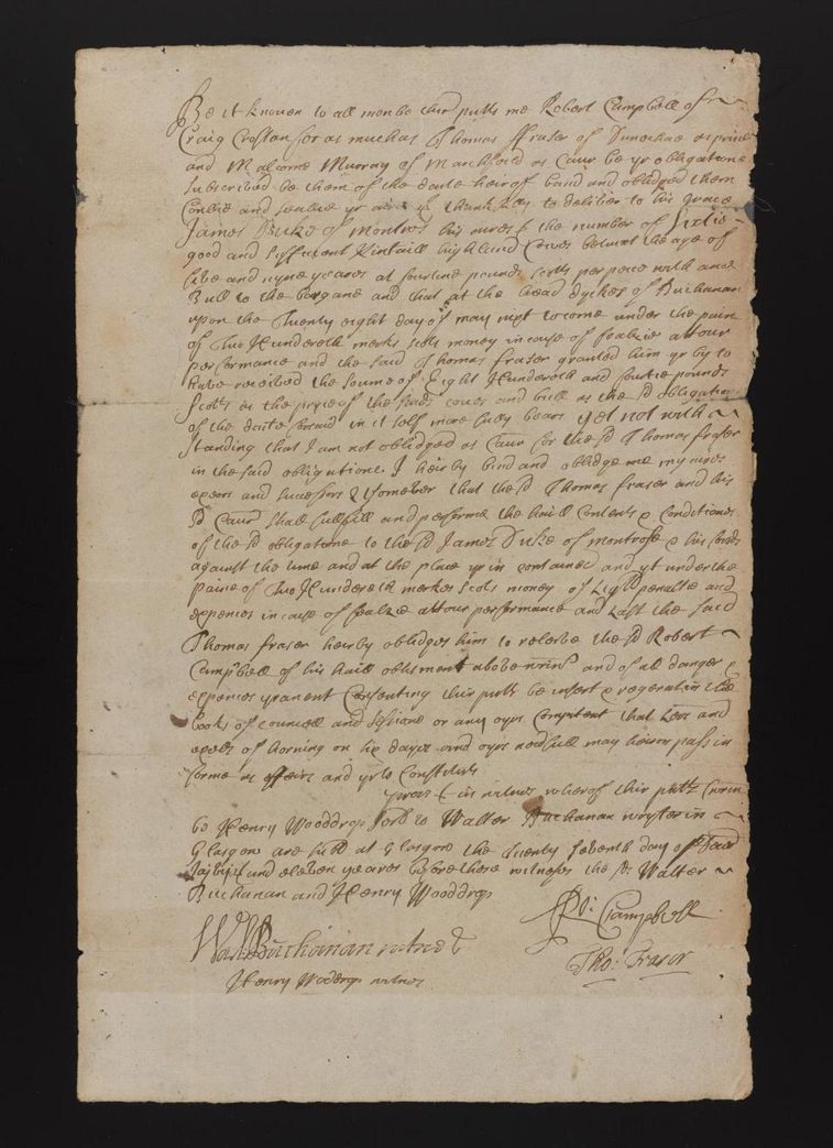 A handwritten torn yellowed piece of parchment in light brown ink.