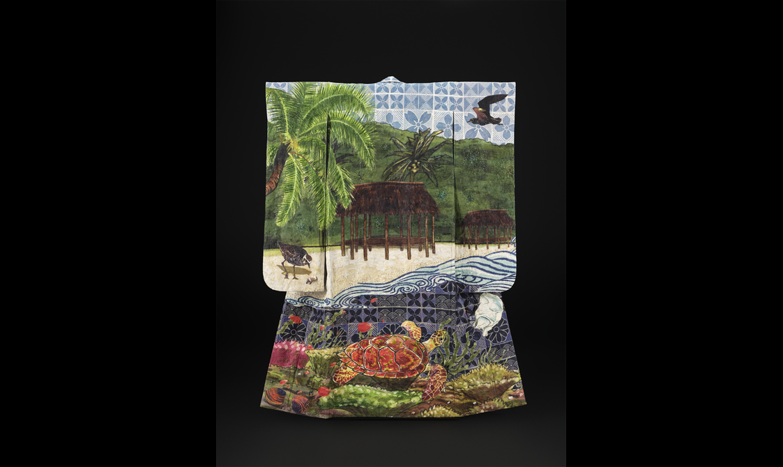 Kimono print showing detail of a turtle swimming towards a plastic bag.