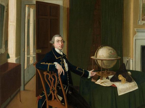A painting of a man with grey hair wearing an admiral uniform with white stockings sitting on a chair in a drawing room beside a table strewn with papers and a globe.