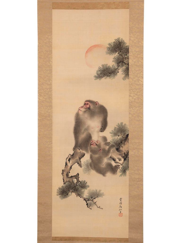 A long rectangular yellowed scroll depicting a monkey with an infant monkey on tree branches