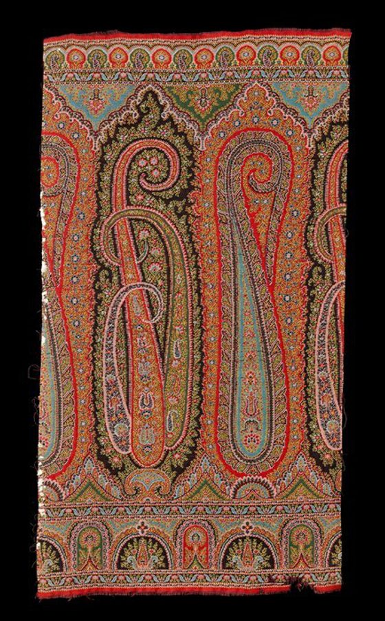 A richly decorated piece of fabric, with a multi coloured design