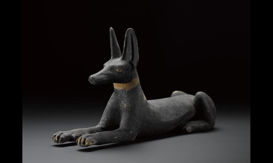 Black statuette of a jackal.