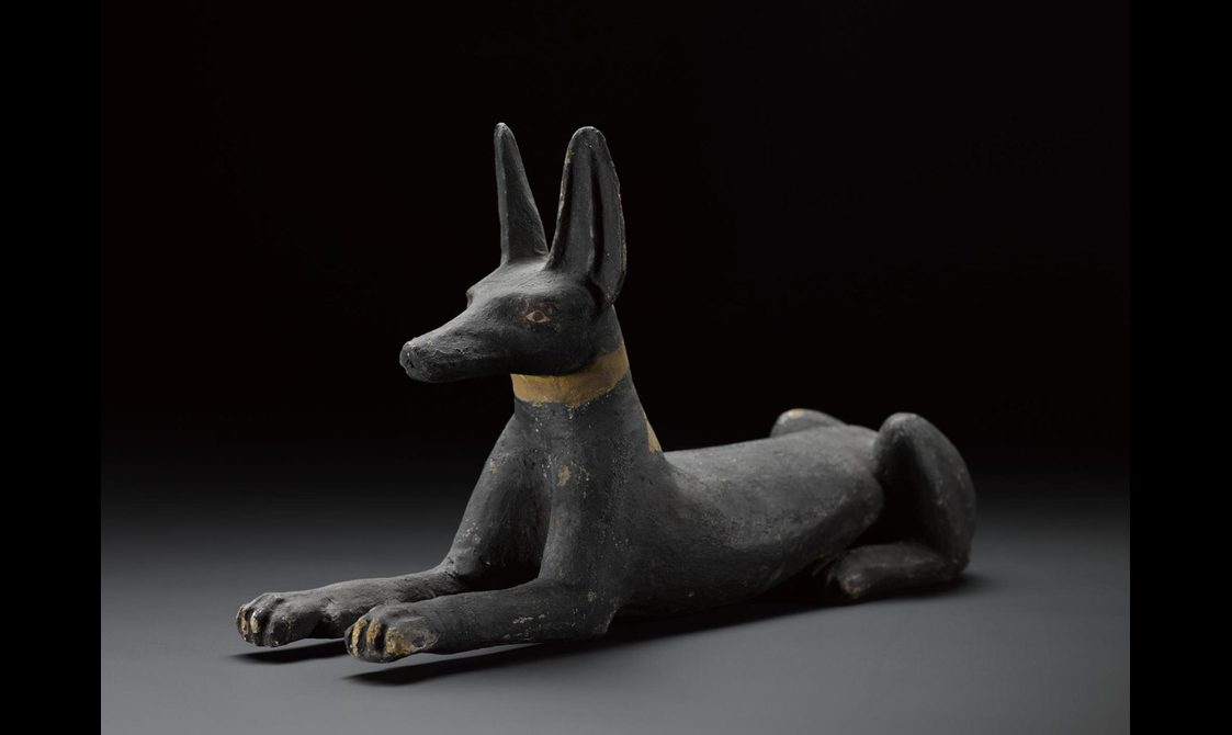 Black statuette of a jackal.