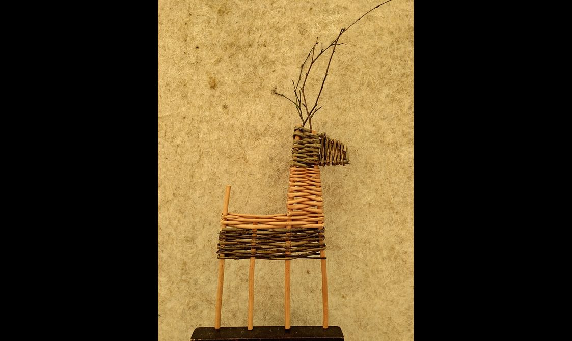A reindeer decoration made out of willow