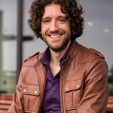 Headshot of historian, Greg Jenner