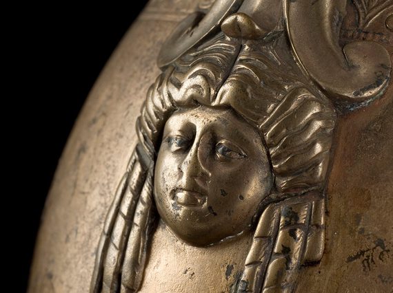 Bronze wine jug with a 3D Roman face engraving attached.