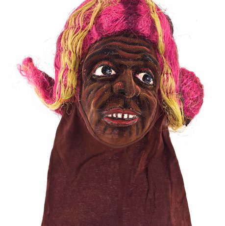 Face mask of a man with pink hair and blonde highlights.