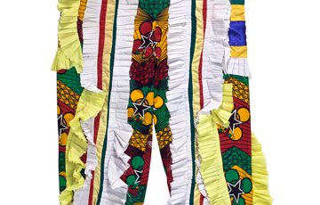 Multicoloured drawstring trousers with white and yellow frills.