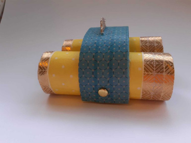Two toilet roll cardboard tubes creatively transformed into a pair of binoculars.