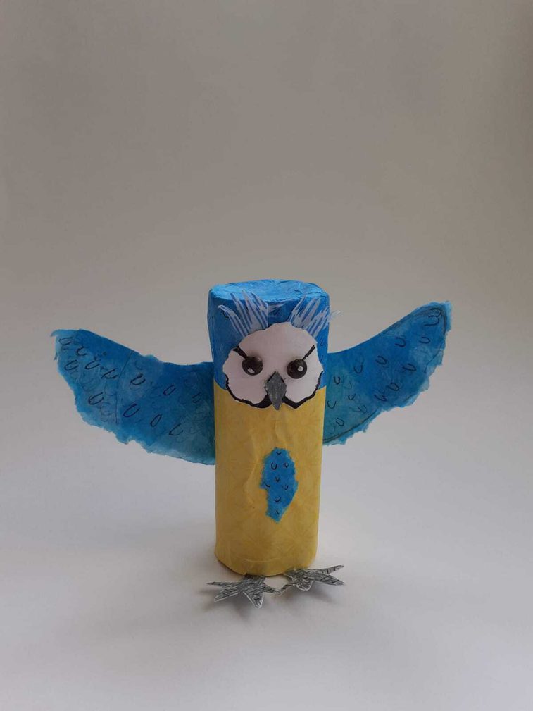 Completed Busy Blue Tit, adorned with eyes, a beak, and feathers.